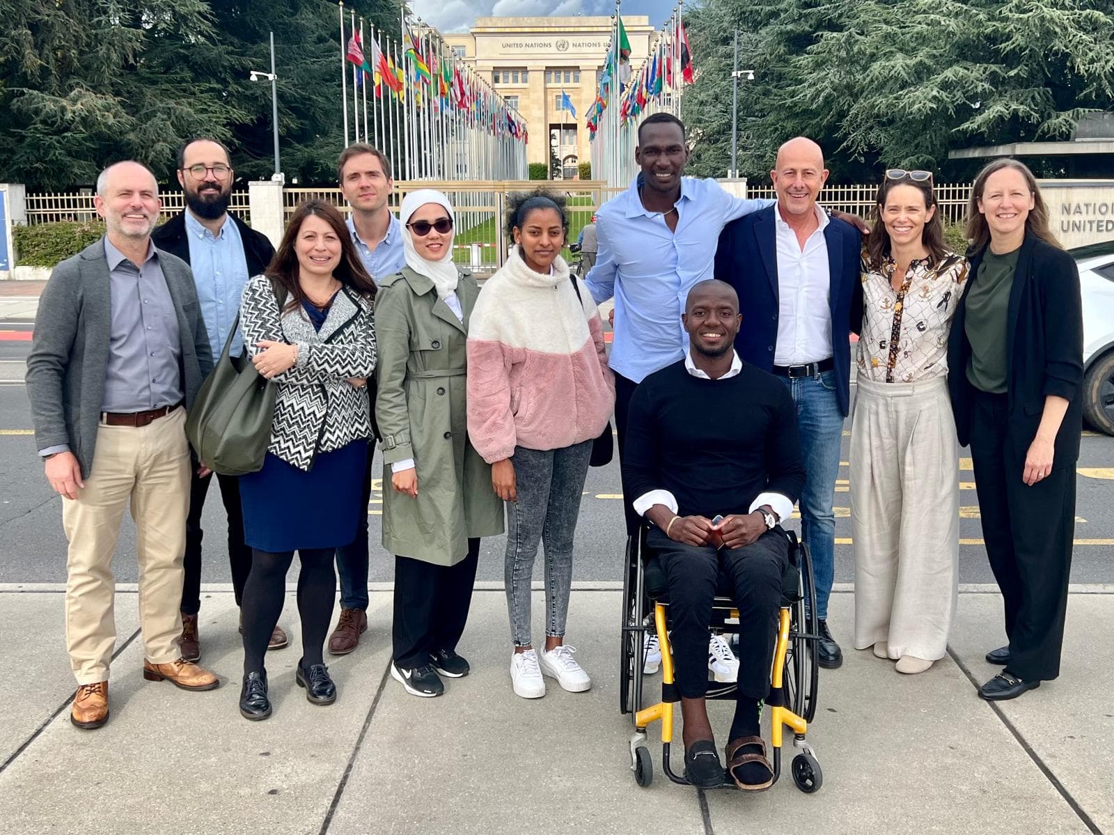 With refugee Olympians and Paralympians in front of the Palais des Nations, Geneva